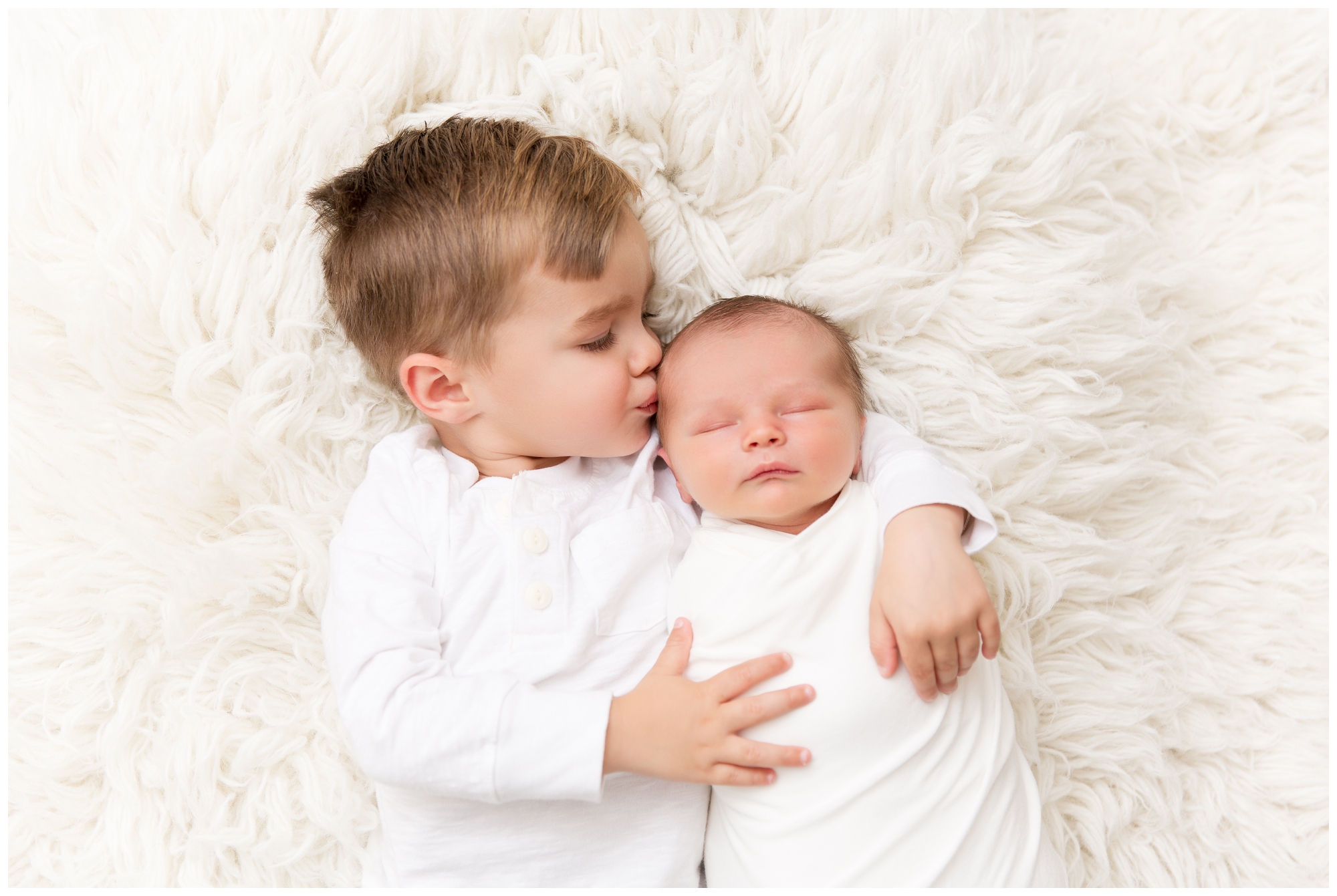 baby boy, white background, big brother, little brother
